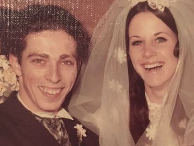 Warren Boyd Sr. and Cynthia S. Boyd are in their wedding dress in the picture.